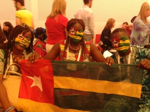 My dear friends from Togo holding their flag